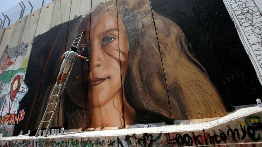 Tamimi, pintada en un muro que separa Israel de Cisjordania.
