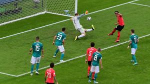 South Korea's defender Kim Young-gwon shoots to score past Germany's goalkeeper Manuel Neuer during the Russia 2018 World Cup Group F football match between South Korea and Germany at the Kazan Arena on June 27, 2018.  