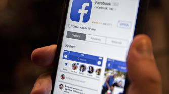 Facebook App And Logo As Crisis Reignites Washington Scrutiny Of Social Networks