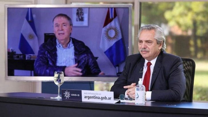 El presidente Alberto Fernández y el gobernador de Córdoba Juan Schiaretti en comunicación virtual