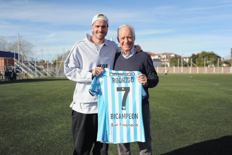 Rodrigo De Paul y Víctor Blanco, presidente de Racing. 