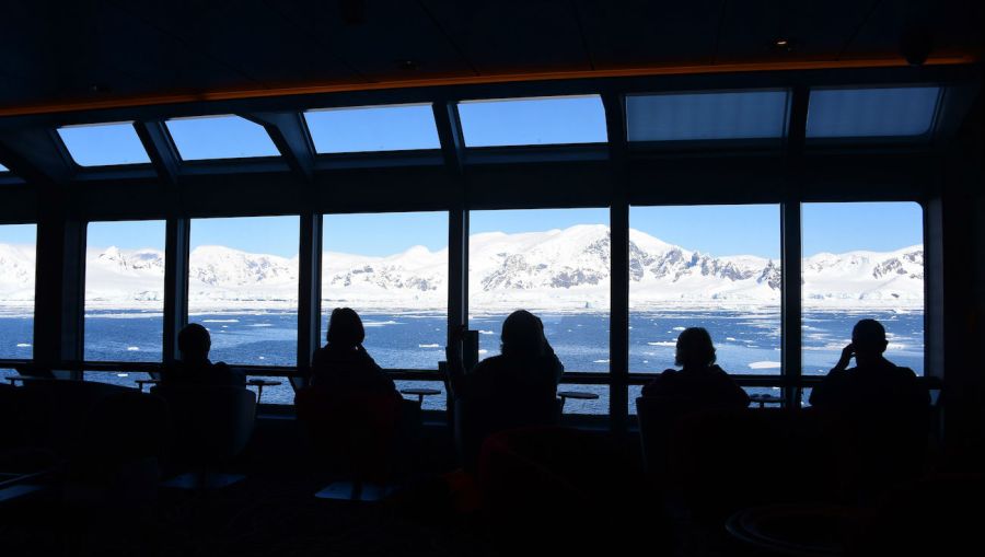 Tourists silhouette on cruise ship stock 