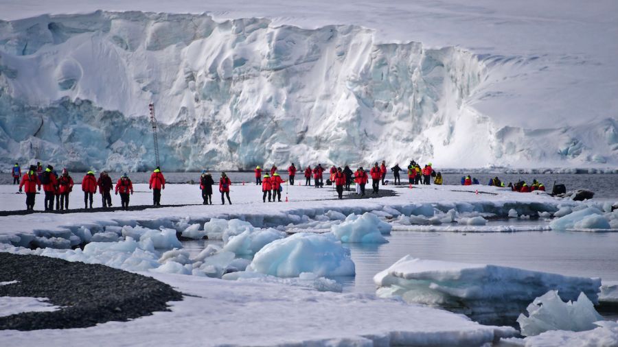 Tourists visit Yankee Harbour Antarctica stock 