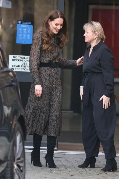Kate Middleton en botas negras