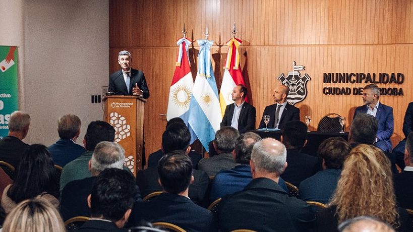 Passerini junto a Mogetta y Fernández