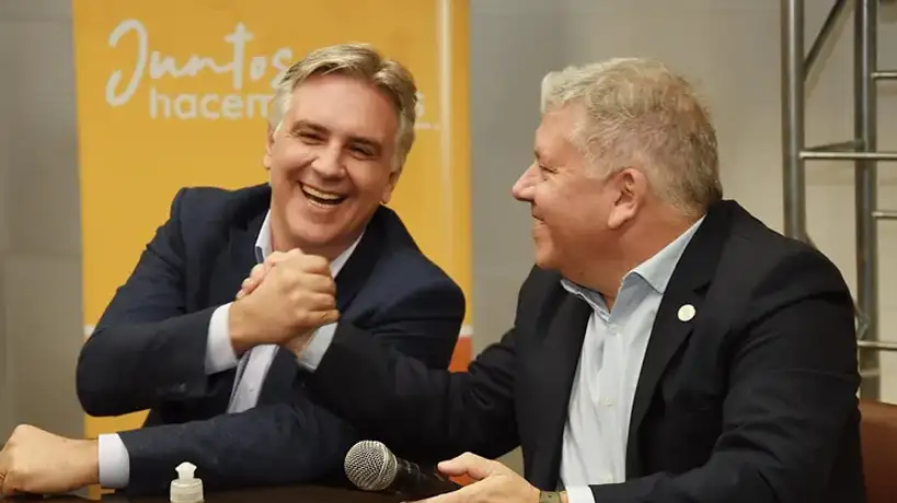 Gustavo Benedetti junto a Llaryora