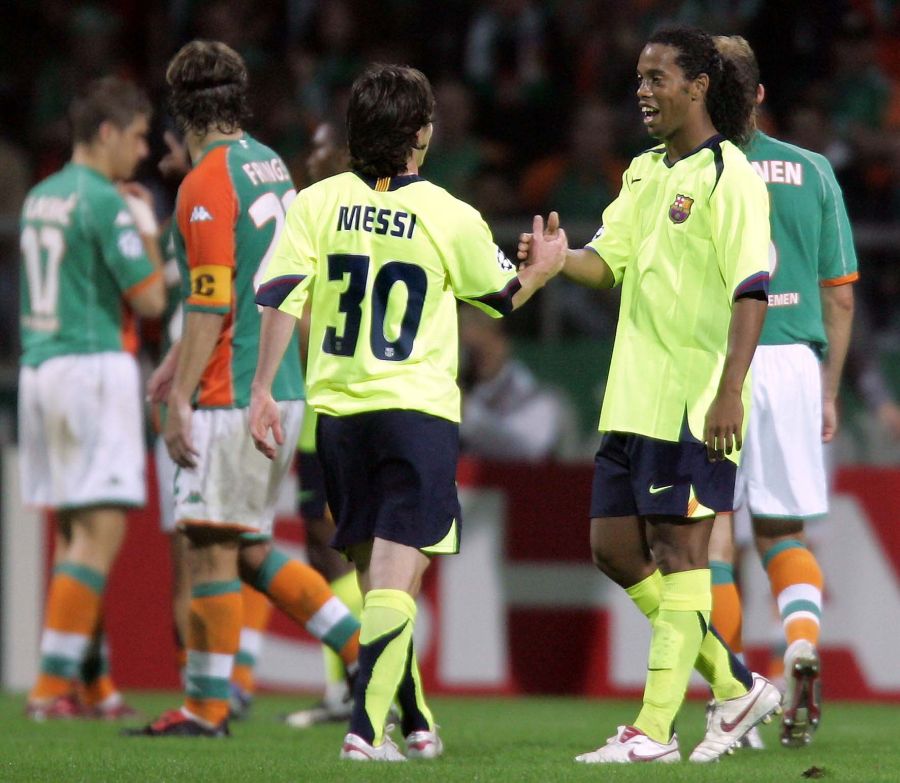 Lionel Messi junto a Ronaldinho