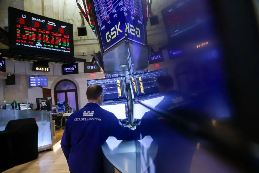 Traders At The New York Stock Exchange As Stocks, Bonds, Dollar Get Hit Amid US-Europe Clash
