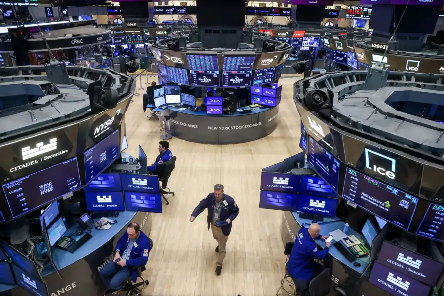 Traders work on the floor the New York Stock Exchange