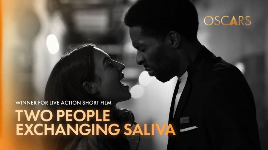 Two people exchanging salive