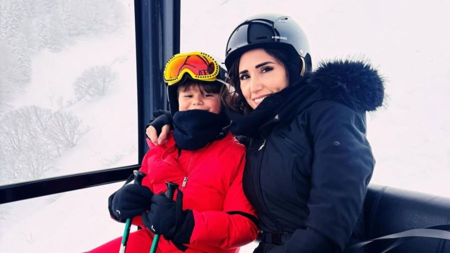 Dibu Martínez y Mandinha