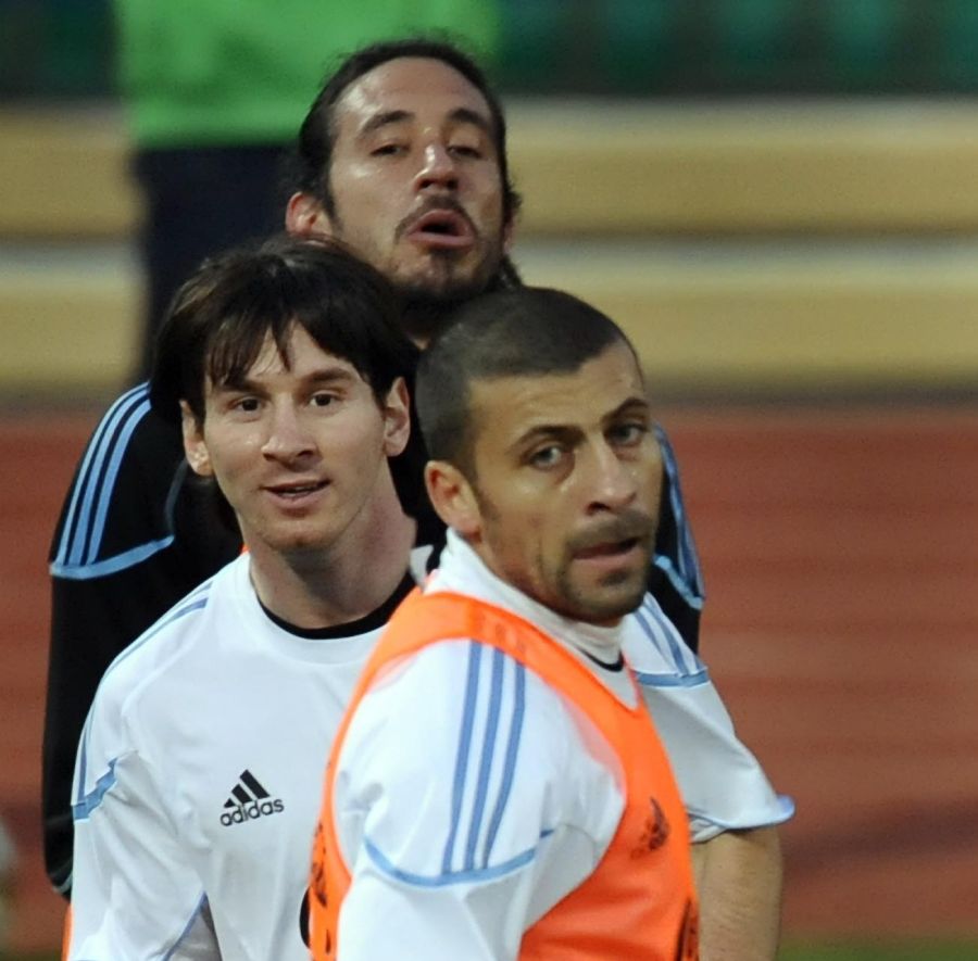 Jonás Gutiérrez y Lionel Messi