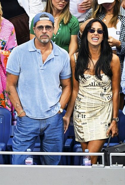 Brad Pitt e Inés de Ramón en el US OPEN