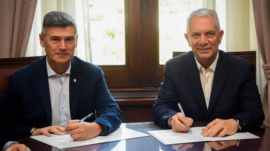 Daniel Passerini junto a Julio Alak