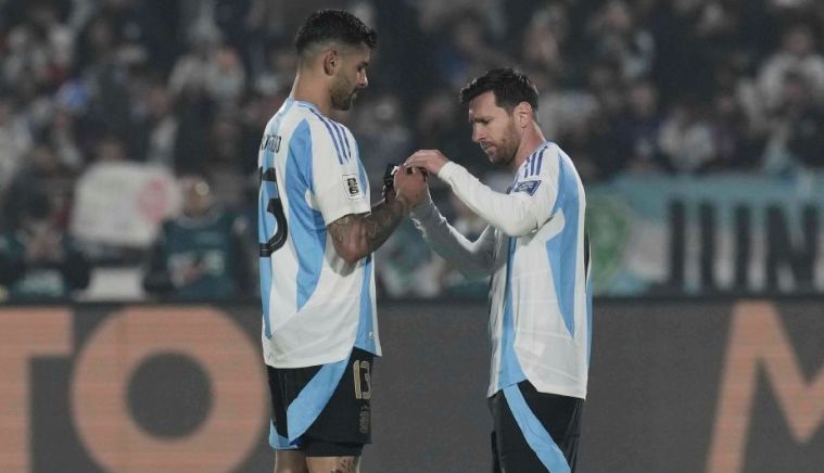 Lionel Messi y Cuti Romero 
