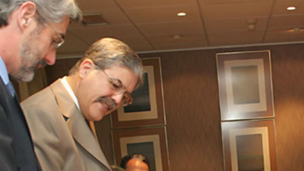 Lisandro Salas junto al ministro de Planificación, Julio De Vido.