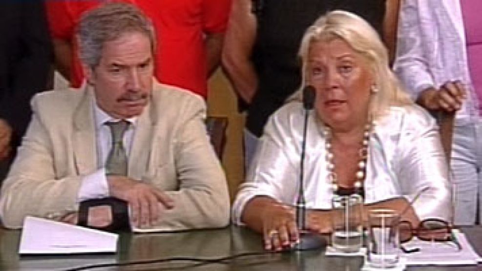 Felipe Solá y Elisa Carrió.
