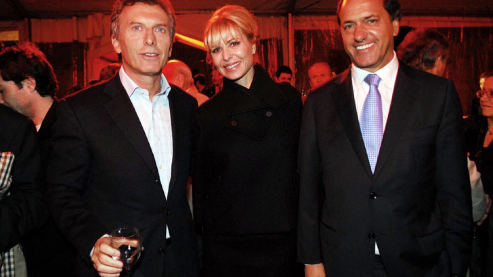 Macri, Scioli y Karina Rabolini en septiembre: "Esta foto me traerá problemas", dijo entonces.