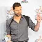 El cantante puertorriqueño Ricky Martin posa tras recibir su galardón 