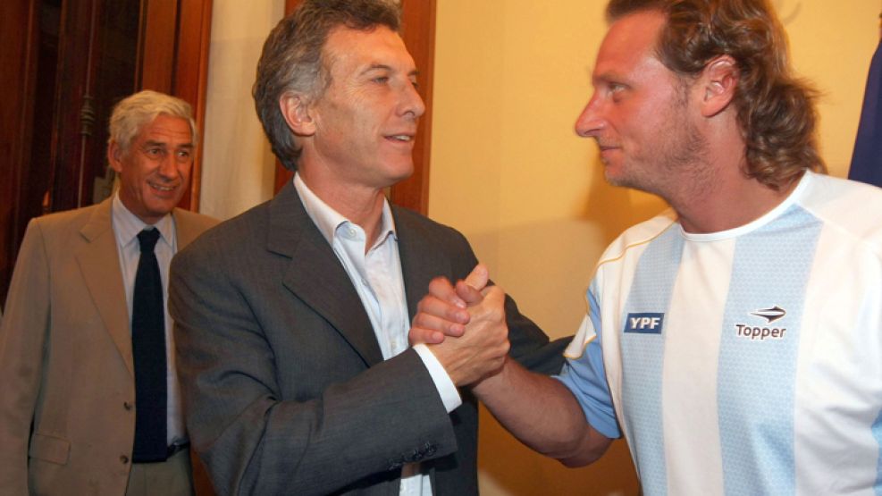 Macri, esta mañana junto a David Nalbandian, el tenista argentino más convocante. 