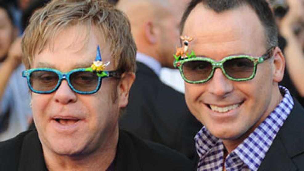 Invitados de lujo: Elton John y su pareja David Furnish.