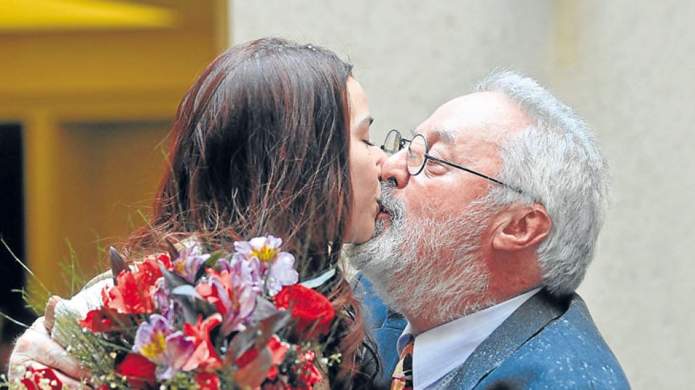 Besito en la frente.