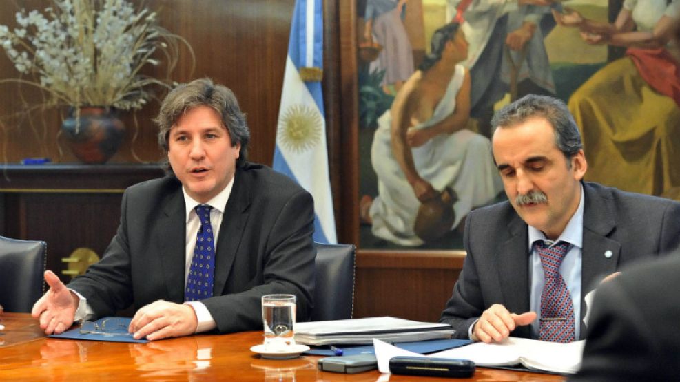 Amado Boudou y Guillermo Moreno. Los dos tuvieron sus opiniones sobre las nuevas medidas contra la fuga de capitales.