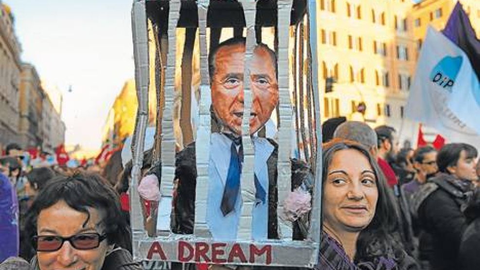 Tengo un sueño. Una manifestación de agosto en Roma, con una imagen de Berlusconi en prisión.