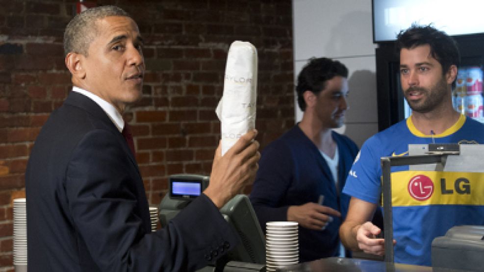 Obama con el hincha de Boca.