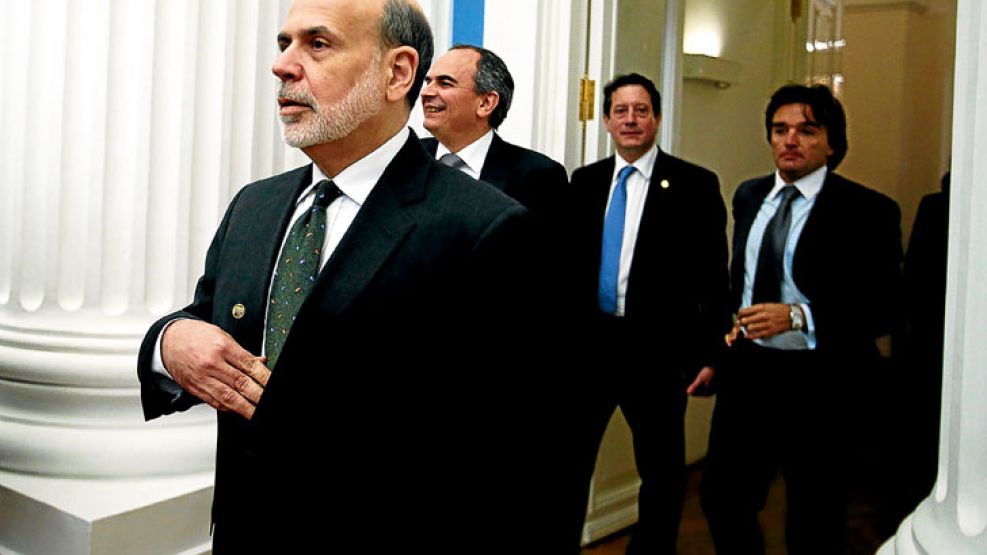 Roce. Bernanke, de la Fed, camina y detrás asoman los argentinos Miguel Pesce (BCRA) y el secretario de Finanzas, Adrián Cosentino.
