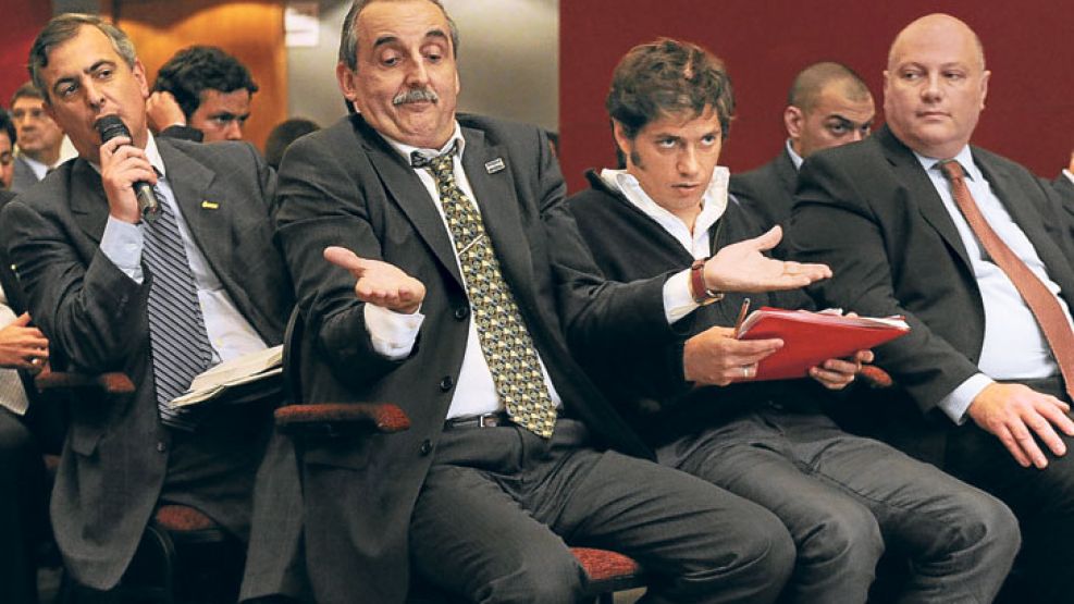 PROTAGONISTAS. En la semana en que el tipo de cambio paralelo volvió a dispararse, Moreno y Kicillof se pavonearon en la asamblea de accionistas del Grupo Clarín.