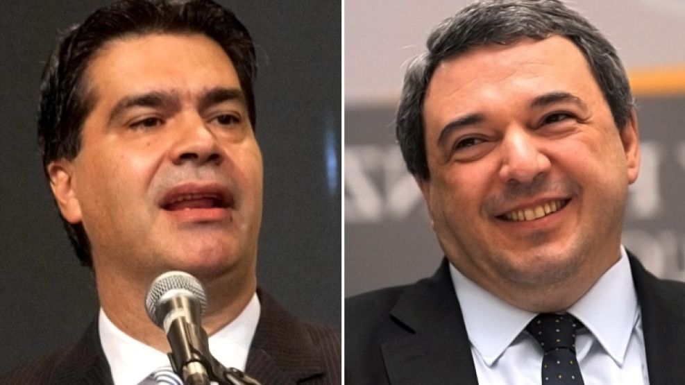 El jefe de Gabinete, Jorge Capitanich y el ministro de Economía uruguayo, Mario Bergara.