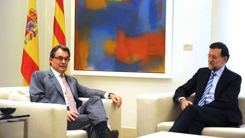 En sus trece. Mas y Rajoy, dos presidentes enfrentados. 