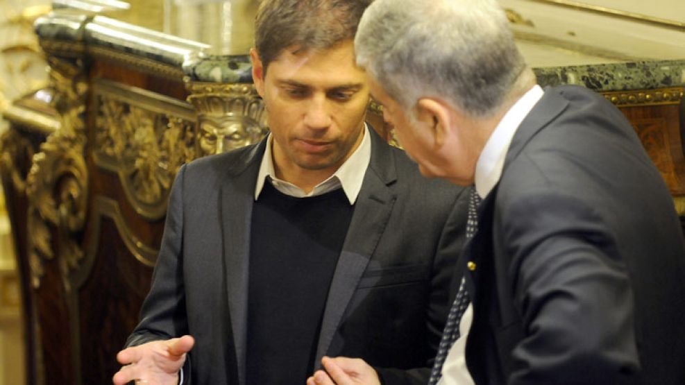 Aparte. Kicillof y De Vido durante el encuentro con los rusos.