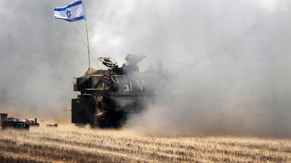 Tanques. Las fuerzas se ubicarán en nuevas posiciones del lado israelí de la frontera, y un pequeño grupo permanecerá en la Franja. 