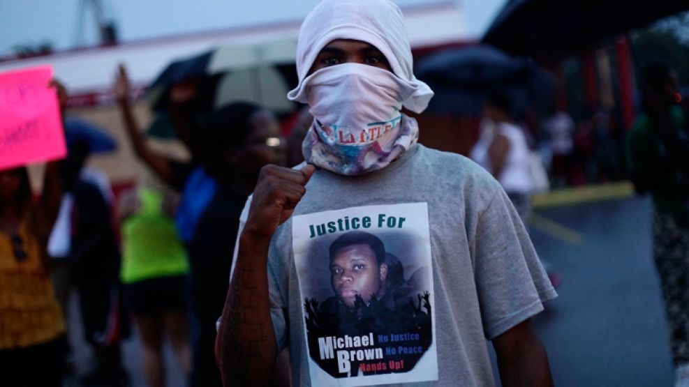 Justicia. La ejecución de Michael Brown, de 18 años, conmocionó a la localidad de Ferguson.