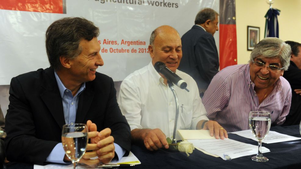 Macri con Venegas y Hugo Moyano.