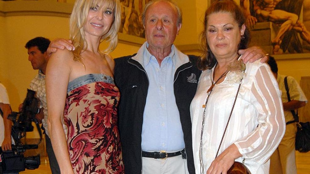 Karina Rabolini junto a sus padres.