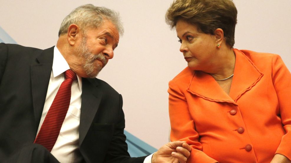 Serios. Lula, acosado por una comisión parlamentaria; Dilma, sin cobertura contra los pedidos de juicio político. Cunha, ex oficialista. 