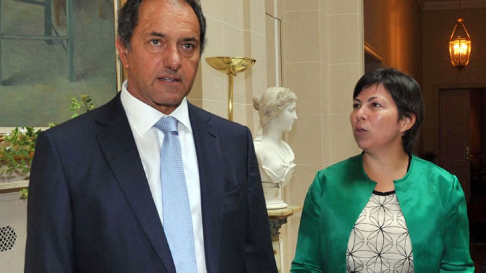 Batakis junto a Scioli. Es su ministra desde 2011.