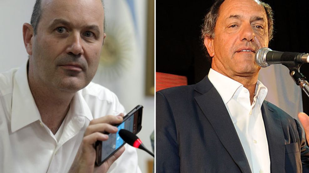 Izquierda: Federico Sturzenegger. Derecha: Daniel Scioli.