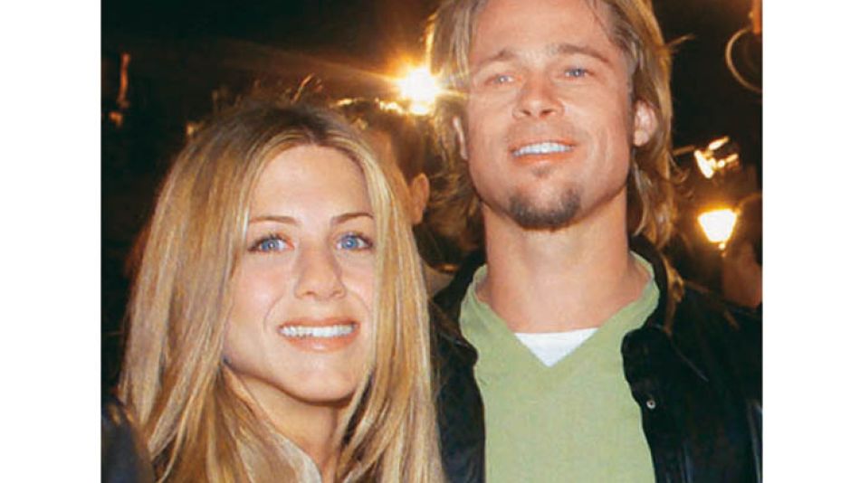 FILE PHOTO OF BRAD PITT AND JENNIFER ANISTON ARRIVING AT PREMIERE