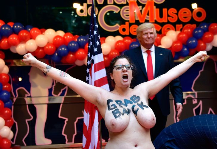 La militante del grupo Femen, conocido por sus espectaculares acciones, irrumpió en la inauguración de la estatua de cera de Trump.