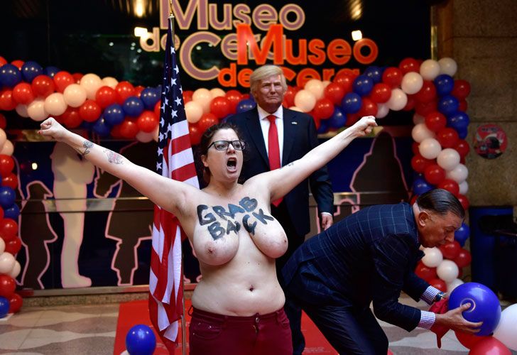 La militante del grupo Femen, conocido por sus espectaculares acciones, irrumpió en la inauguración de la estatua de cera de Trump.