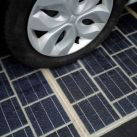 the-tyres-of-an-automobile-are-seen-on-a-solar-panel-road-during-its-inauguration-in-tourouvre-normandy-northwestern-france-december-22-2016-reuters-benoit-tessier-700x466