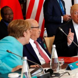 german-chancellor-angela-merkel-sits-next-to-tunisias-president-beji-caid-essebsi-and-speaks-to-us-president-donald-trump-as-they-attend-a-g7-expanded-session-during-the-g7-summit-in-taormina 