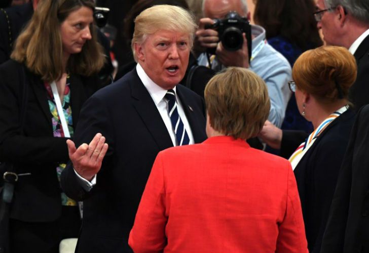 Pese a su discreción, la premier alemana no pudo ocultar su disgusto con Trump y Putin durante la reunión del G20.