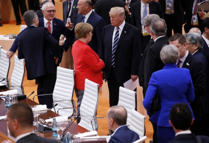 Pese a su discreción, la premier alemana no pudo ocultar su disgusto con Trump y Putin durante la reunión del G20.