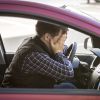 portrait-of-shocked-male-driver-closing-face-with-hands
