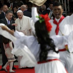 Pope Francis greets the crowd as he arrives at Bolívar Square in Bogotá on Thursday.